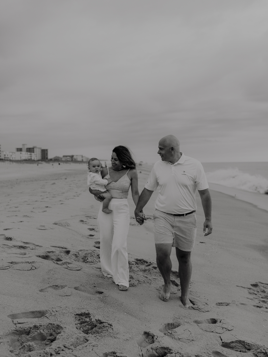 Family Black and White Portrait Walking on the Beach